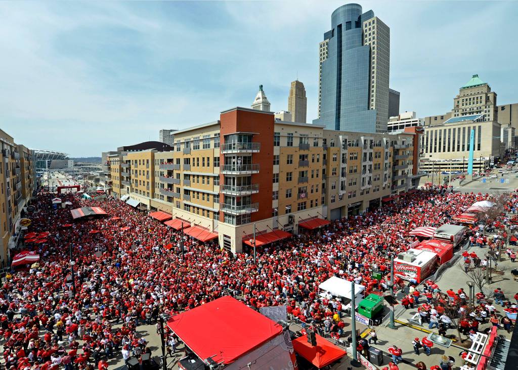 Fans celebrating Cincinnati Reds Opening Day at The Banks outside Great American Ball Park.